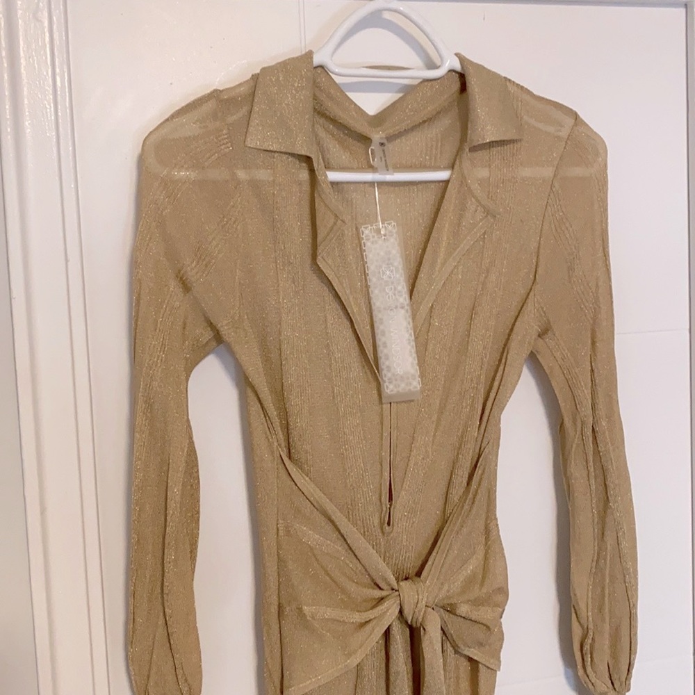 Long gold sparkle stretchy long sleeve tie waist.